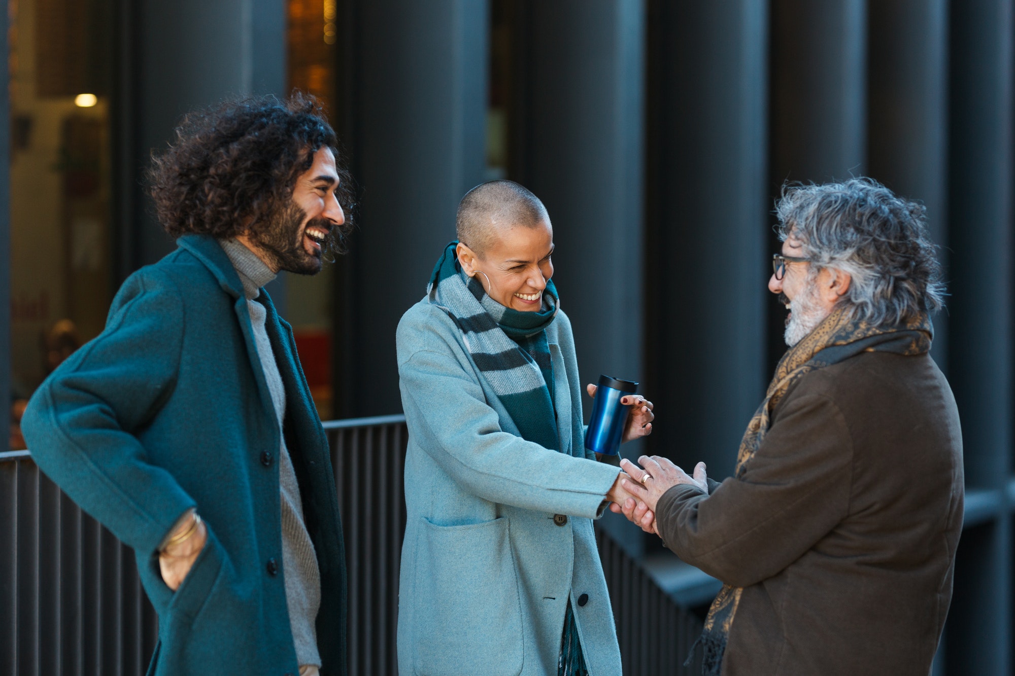 Professional business people talking and meeting on the street